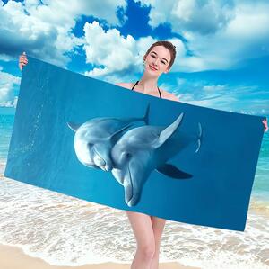 Plážová modrá osuška s delfínmi Modrá
