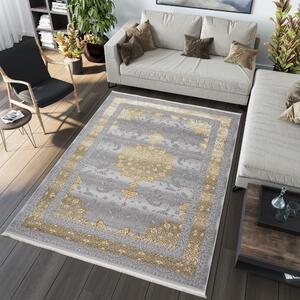 Exkluzívny koberec sivej farby so zlatým orientálnym vzorom Šírka: 80 cm | Dĺžka: 150 cm