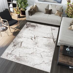 Krémový dizajnový vintage koberec s abstraktným vzorom Šírka: 160 cm | Dĺžka: 230 cm
