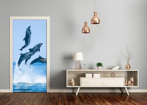 Fototapeta samolepiace na dvere skákajúci delfíny 75x205 cm