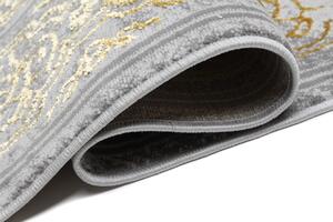 Exkluzívny moderný koberec sivej farby so zlatým orientálnym vzorom Sivá Šírka: 80 cm | Dĺžka: 150 cm