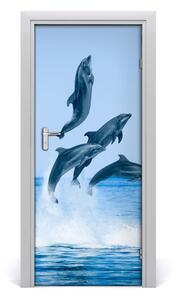 Fototapeta samolepiace na dvere skákajúci delfíny 85x205 cm