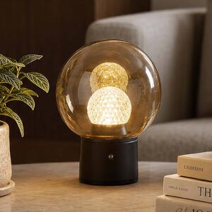 Searchlight Stolová LED lampa Solis s akumulátorom, bronzová, sklo, 2 700 K, Krémová / jantárovo žltá, Obývacia izba / jedáleň, kov, Stojacie svietidlo