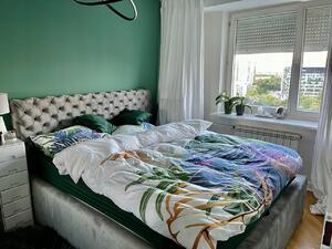 Moderná čalúnená posteľ FIGO - Drevený rám, 120x200