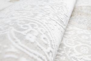 Jemný vintage koberec s béžovými ornamentmi krémová Šírka: 140 cm | Dĺžka: 200 cm