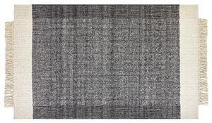 Koberec čierna a krémová biela 140 x 200 cm obdĺžnikový ručne tkaný so strapcami moderný dizajn