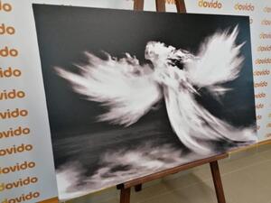 Obraz podoba anjela v oblakoch v čiernobielom prevedení - 60x40