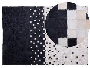 Kožený koberec čierny a béžový 140 x 200 cm pravá hovädzia koža patchworkový moderný vzorovaný