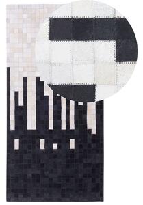 Koberec čierno-biely kožený 80 x 150 cm pravá hovädzia koža abstraktný patchworkový obdĺžnikový moderný