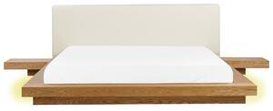 Posteľ v japonskom štýle prírodný jaseň 180 x 200 cm nízky drevený rám postele z MDF koženkové čelo LED podsvietenie nočné stolíky