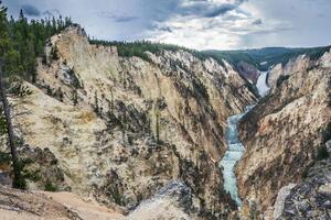 DIMEX | Vliesové fototapety na stenu Yellowstone a Grand Canyon MS-5-3043 | 375 x 250 cm | zelená, modrá, hnedá, šedá
