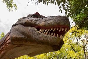 DIMEX | Vliesové fototapety na stenu Hlava T-Rexa MS-5-0468 | 375 x 250 cm | zelená, hnedá