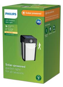 Solárne nástenné svietidlo Philips LED Shroud, čierne/opálové, senzor