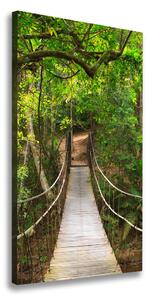 Vertikálny foto obraz canvas Visiaci most v lese