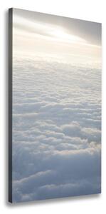 Vertikálny foto obraz na plátne Let nad oblaky