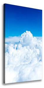 Vertikálny foto obraz na plátne Let nad oblaky