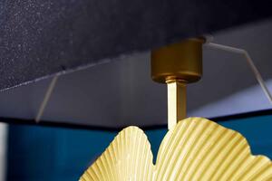 Dizajnová stolová lampa Rashid čierno-zlatá