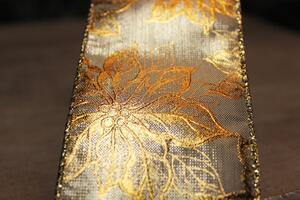 Zlatá lesklá stuha so zlatým kvetinkovým vzorom