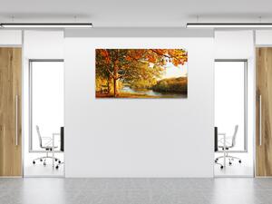 Obraz sklenený jesenný strom s lavičkou pri rieke - 30 x 40 cm