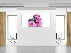 Obraz sklenený kvet orchidea na kameni a hladine - 30 x 60 cm