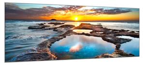 Obraz sklenený západ slnka nad oceánom - 34 x 72 cm