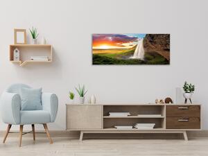 Obraz sklenený vodopád v horách a západ slnka - 50 x 100 cm