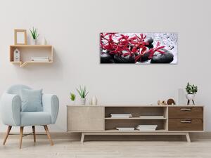 Obraz sklenený červený kvet a čierne kamene - 30 x 60 cm