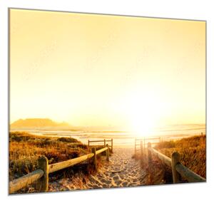 Obraz sklenený mora s piesočnou plážou pri západe slnka - 34 x 34 cm