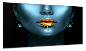Obraz sklenený abstraktné ženská tvár zlaté pery - 50 x 70 cm
