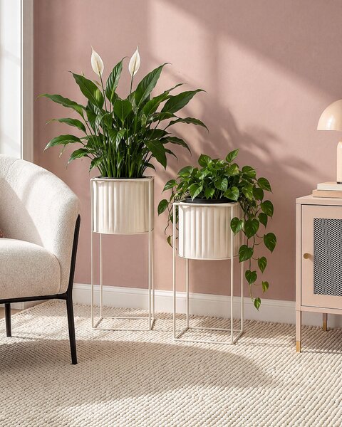 Sada 2 kvetináčov na nožičkách ružová kovová železo 20 x 20 x 41 / 22 x 22 x 46 cm stojace okrúhly tvar glamour štýl obývacia izba