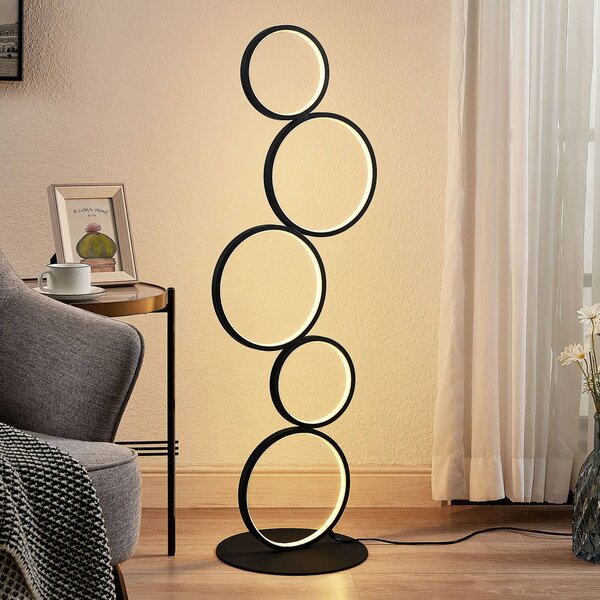 Lindby LED stojacia lampa Jacek, čierna, kov, 110 cm, krúžky, Čierna, Obývacia izba / jedáleň, kov, Moderný
