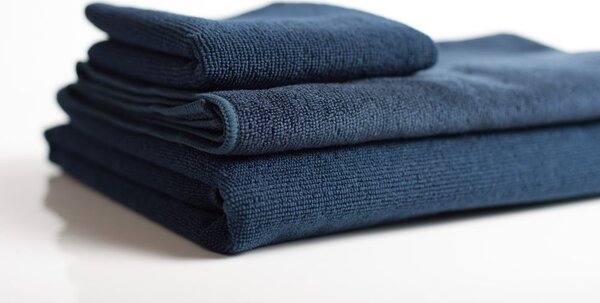 Towel City Rýchloschnúci športový uterák 110x30 - Biela