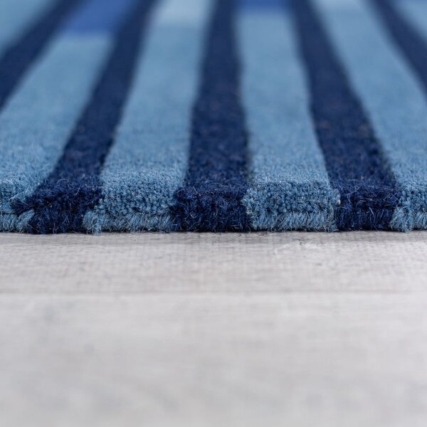 Tmavomodrý ručne tkaný vlnený koberec 120x180 cm Conway Retro – Flair Rugs