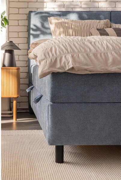 Modrá boxspring posteľ s úložným priestorom 160x200 cm Elva Bold – Selection