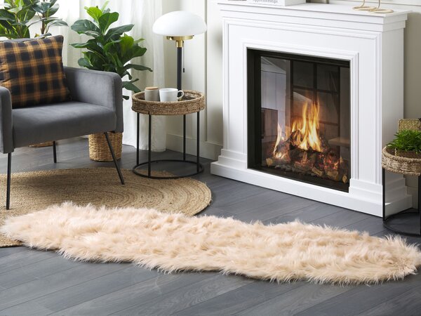 Umelá ovčia kožušina broskyňová akryl 180 x 60 cm glamour kožušina elegantný dizajn spálňa obývacia izba