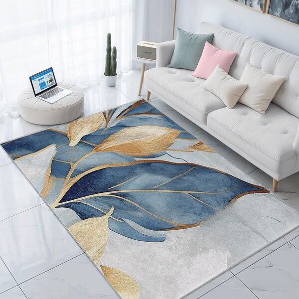 Prateľný koberec v modrej a zlatej farbe 120x180 cm Golden Leaves – Mila Home