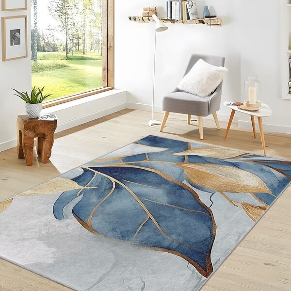Prateľný koberec v modrej a zlatej farbe 120x180 cm Golden Leaves – Mila Home