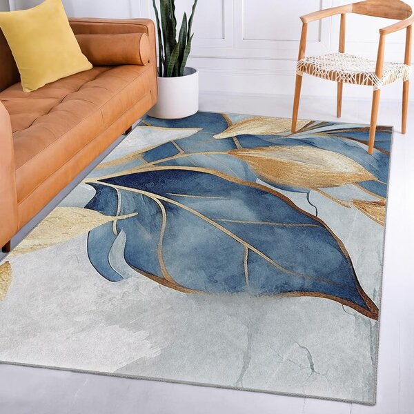 Prateľný koberec v modrej a zlatej farbe 120x180 cm Golden Leaves – Mila Home