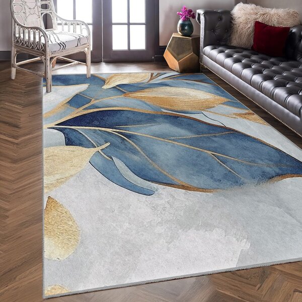 Prateľný koberec v modrej a zlatej farbe 120x180 cm Golden Leaves – Mila Home
