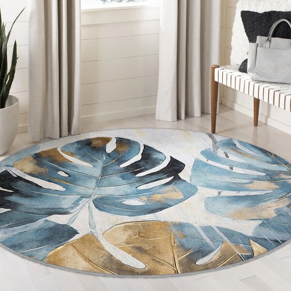 Modrý prateľný okrúhly koberec ø 80 cm Golden Leaves – Mila Home