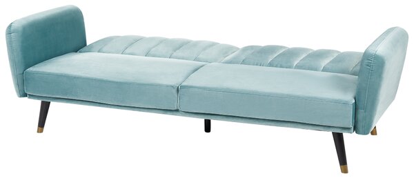 Rozkladacia pohovka svetlomodrá zamatové čalúnenie vhodná na spanie elegantná moderná obývacia izba spálňa