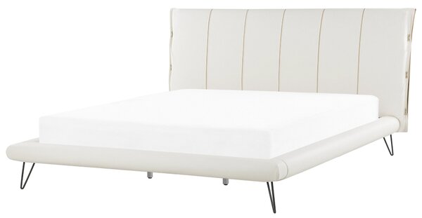 Posteľ svetlobéžová umelá koža 180 x 200 cm prešívané čelo postele tenké čierne nohy moderný dizajn