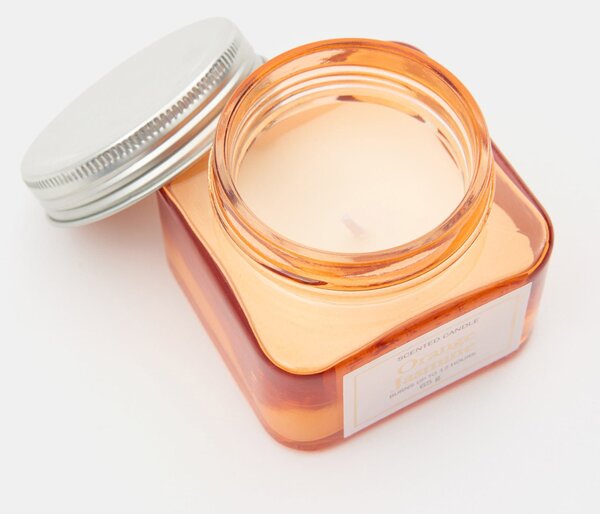Sinsay - Voňavá sviečka Orange Jasmine - svetlooranžová