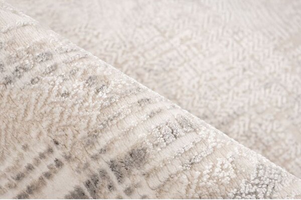 Svetlý abstraktný koberec CHalet Pierre Cardin 702 Beige Silver 0,80 x 1,50 m