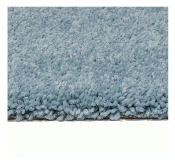 Bledomodrý koberec Universal Aqua, 57 × 110 cm