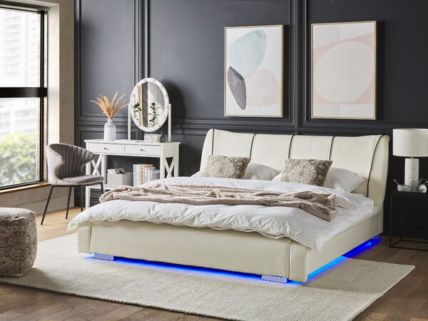 Vodná posteľ biela kožené čalúnenie 140 x 200 cm LED osvetlenie s roštom prešívané čelo redukcia vĺn moderný štýl spálňa