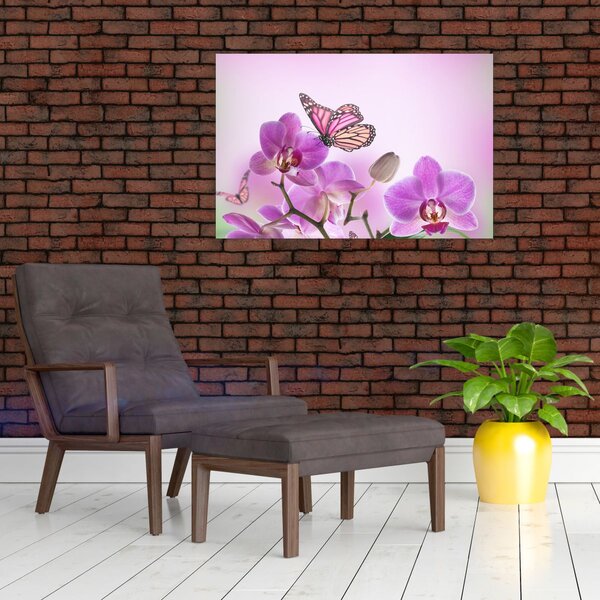 Obraz - Motýľ na kvetoch orchidey, lila (90x60 cm)
