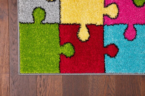 Koberec Agnella Funky Top Super Puzzle žltý