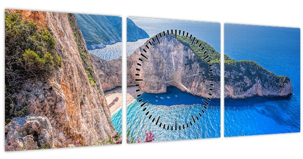Obraz - Pláž Navagio, Grécko (s hodinami) (90x30 cm)