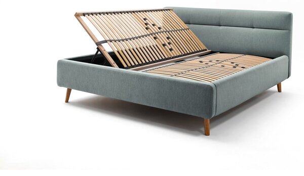 Svetlomodrá čalúnená dvojlôžková posteľ s úložným priestorom s roštom 160x200 cm Lotte – Meise Möbel
